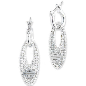 Silver hoop earrings with clear gemstones on a white background
