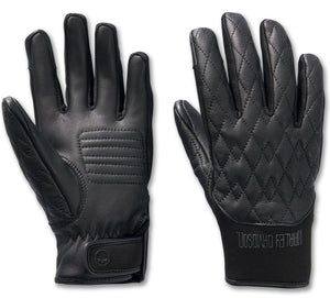 Pair of black gloves with quilted design on a white background