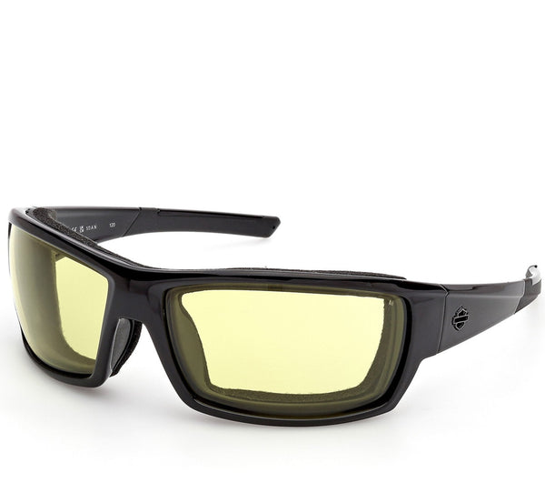 Sunglasses with yellow lenses and black frame on a white background