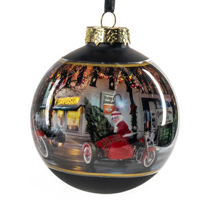 Christmas ornament with a Harley Davidson store and Santa Claus reflection