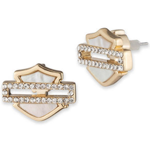 Gold and crystal earrings on a white background