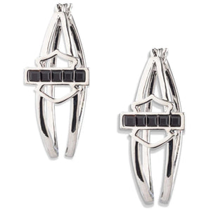 A pair of silver-toned drop earrings with a central horizontal bar set with four small black stones, shown on a plain white background.