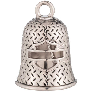Silver bell with intricate design on a white background