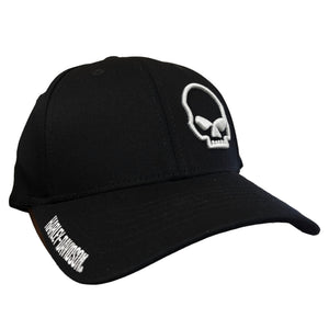 A black baseball cap featuring a white embroidered skull logo on the front and white text on the brim, shown against a plain white background.