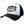 A black and white Harley-Davidson trucker-style baseball cap with a white front panel, black side and back panels, a black brim, and a black embroidered patch on the front featuring the brand name and logo.