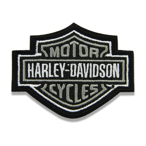 An embroidered Harley-Davidson bar and shield patch with black, white, and gray colors, shown on a plain white background.