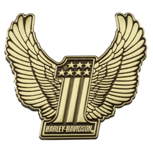 A Harley-Davidson winged number 1 lapel pin in a gold-tone finish, featuring a central vertical number 1 with five stars on a black background at the top, flanked by symmetrical wings, and a Harley-Davidson logo plaque at the bottom, isolated on a white background.