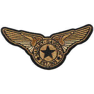 Harley-Davidson wings patch in gold and black embroidered thread, featuring a central star and the words 'Harley-Davidson' and 'Est. 1923' on a plain white background.