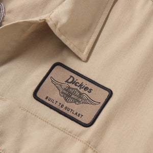 Dickies logo on a beige jacket