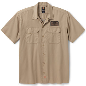 Beige short-sleeve shirt with button details on a white background