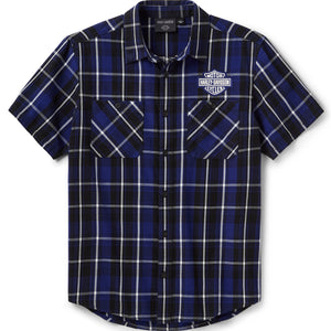 Blue and black plaid shirt with a logo on a white background