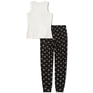 White tank top and black patterned pants on a white background