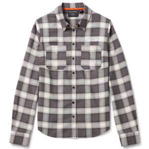 Plaid shirt with visible brand logos on a white background