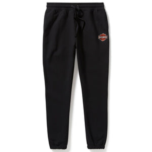 Black sweatpants with a logo on the left leg against a white background