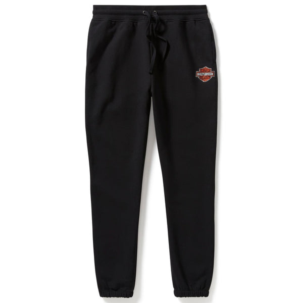 Black sweatpants with a logo on the left leg against a white background