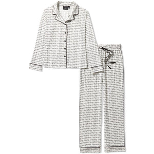 Black and white striped pajama set on a white background