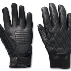Pair of black gloves with quilted design on a white background