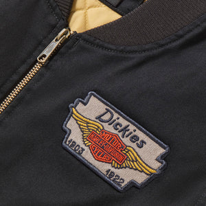 Dickies logo patch on a jacket with zipper detail