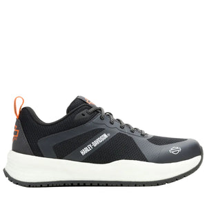 Black and gray sneaker with orange accents on a white background