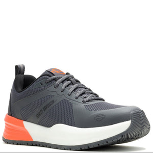 Gray athletic shoe with orange accent on a white background