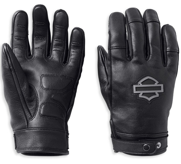 Pair of black leather gloves with a logo on a white background