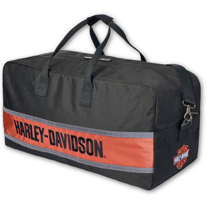 A black Harley-Davidson duffel bag with a wide orange-red stripe across the front featuring the brand name in black, plus a small Harley-Davidson logo patch on the lower right corner, shown on a plain white background.