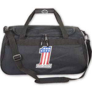 A black duffel bag with a Harley-Davidson logo featuring an American flag design, shown on a plain white background.