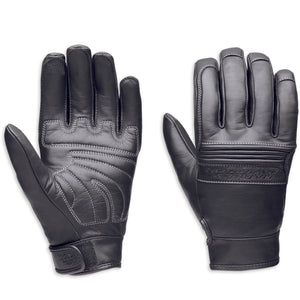 Pair of black leather gloves on a white background