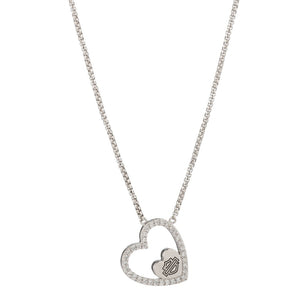 Silver necklace with a heart-shaped pendant on a white background