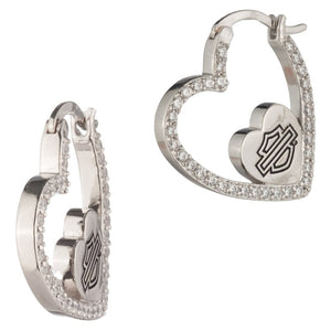 Heart-shaped silver earrings with a central logo on a white background