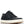 A low-top sneaker in black suede and smooth synthetic fabric, featuring black laces, silver metal eyelets, and a thick off-white platform sole with a brown outsole, shown against a plain white background.