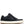 A low-top sneaker in black suede and leather with silver metal studs, black laces, and a thick off-white midsole, shown from a side profile on a white background.