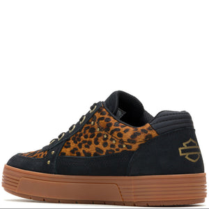 A low-top skate shoe featuring a black suede base, a brown and black leopard print pattern on the side panels, a black tongue, and a brown gum rubber sole. A gold Harley-Davidson logo is printed on the heel.