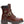 A brown leather lace-up work boot with a dark brown heel panel, a gold-tone Harley-Davidson logo badge, a buckle strap across the ankle, and a rugged dark sole, shown against a plain white background.