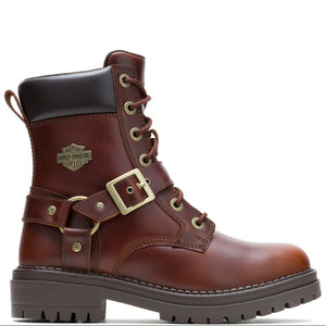 A brown leather lace-up work boot with a dark brown heel panel, a gold-tone Harley-Davidson logo badge, a buckle strap across the ankle, and a rugged dark sole, shown against a plain white background.