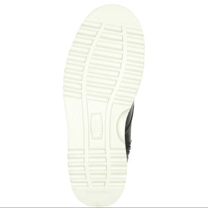 Close-up of a white shoe sole on a white background