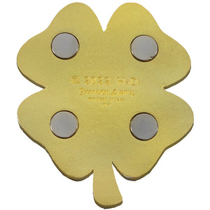 A gold-colored four-leaf clover-shaped metal charm with four circular silver magnets embedded in the center, shown on a plain white background.
