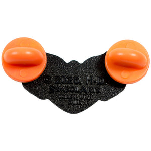 A black textured plastic accessory with two bright orange oval suction-like grips attached, photographed on a plain white background. Embossed text in the center reads '© 2026 H.