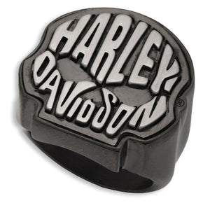 A dark gray metal ring featuring a raised Harley-Davidson logo and skull emblem, shown on a plain white background.