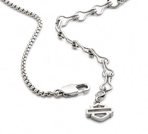 Silver chain bracelet with a clasp on a white background