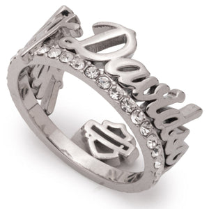 A silver-toned Harley-Davidson name ring featuring the brand name in cursive script, accented with clear pavé stones and a small Harley-Davidson bar and shield emblem on the band, shown on a white background.