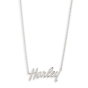 A silver script name necklace spelling 'Harley' with small clear stones, suspended on a delicate silver chain against a plain white background.