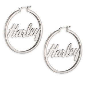 A pair of silver-tone hoop earrings featuring the word 'Harley' in a cursive script cutout, set against a plain white background.