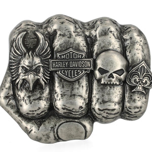 Harley Davidson belt buckle with eagle, skull, and playing card symbols on a white background