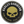 A circular Harley-Davidson emblem or badge with a black face, a large gold skull in the center, and white and gold text reading 'HARLEY-DAVIDSON' and 'LIVE TO RIDE - RIDE TO LIVE' around the border.