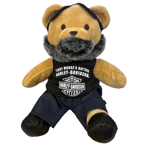 Teddy bear wearing a Harley-Davidson shirt on a white background