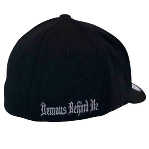 Black cap with 'Demons Behind Me' text on a white background