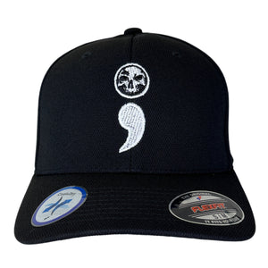 Black cap with a white semicolon and skull design on a white background