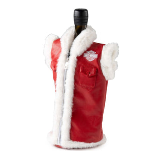 Red leather wine bottle cover with white fur trim on a white background