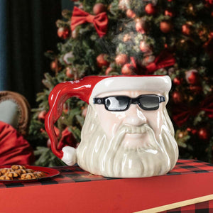 Santa Claus mug with a Christmas tree in the background